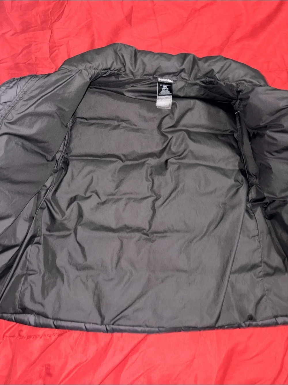 The North Face kids Black Puffer Jacket with Logo